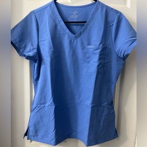 Lightly used scrub uniform set. Medium top and medium petite pants.